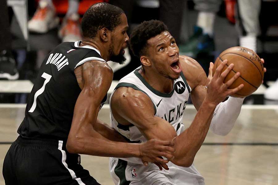 BUCKS WIN A NAIL-BITER - Journal News